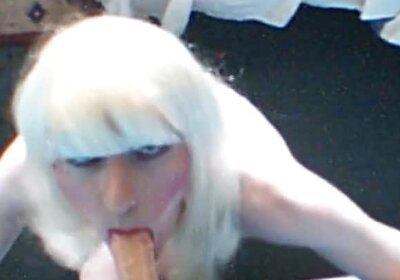 Sissy CD gets a face full from a cum-spewing dildo 13506487