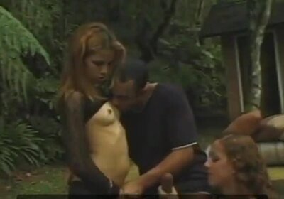 Cute chick loves to suck a big dick while getting doggy style fuck from tranny