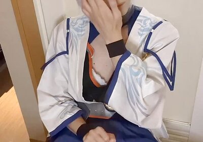 Cosplayer with a plug inserted