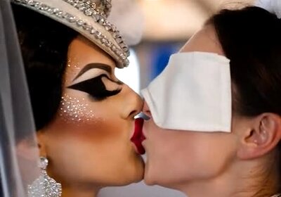 Drag Queen Kissing Her Maid