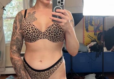 Cougar plays with her tail