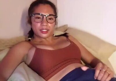 Shemale gently caresses her dick.