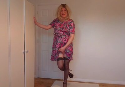 Hold up black stockings and G-string