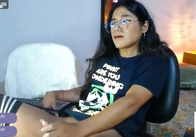Latin teen with glasses shoots cum