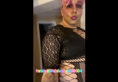 Sissy femboy showing tramp stamps