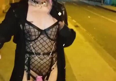 Taniax walks around the city in sexy black lingerie,showing her tiny cock in flat chastity cage