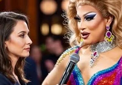Drag Queen Kisses Female Reporter