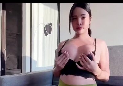 Asian shemale with amazing jugs