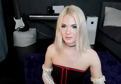 Shemale plays with her cock while giving it a twist.