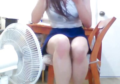 A seductive college bitch plays alone inserting cucumber, bottle, and a syringe of egg into her